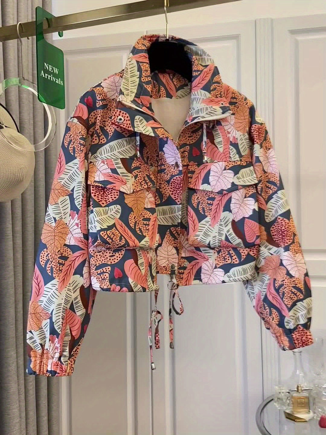 Damjacka kort modell med ståkrage och mönster, blixtlås, reglerbar midja